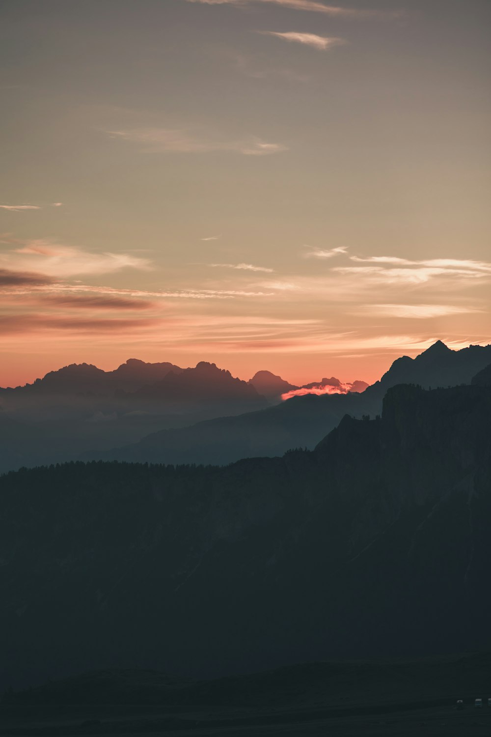 silhouette of mountains during sunset