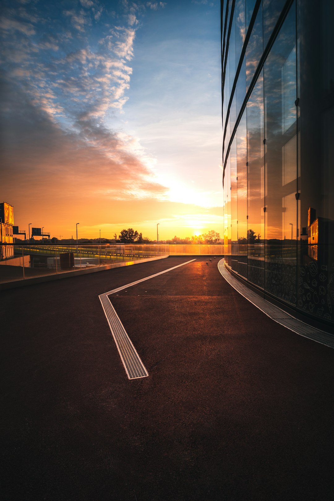 black asphalt road during sunset