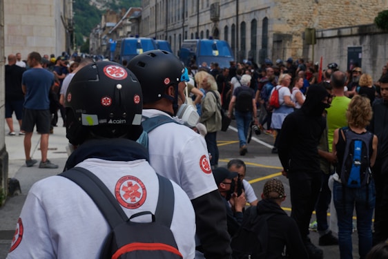 A collage showing police uniforms, health insurance documents, and a delivery truck in action.
