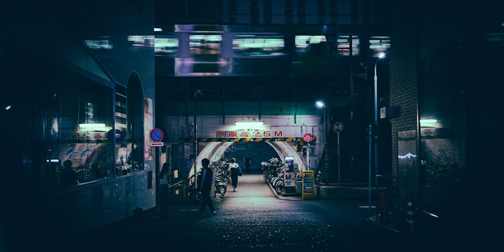 cars parked in front of building during night time