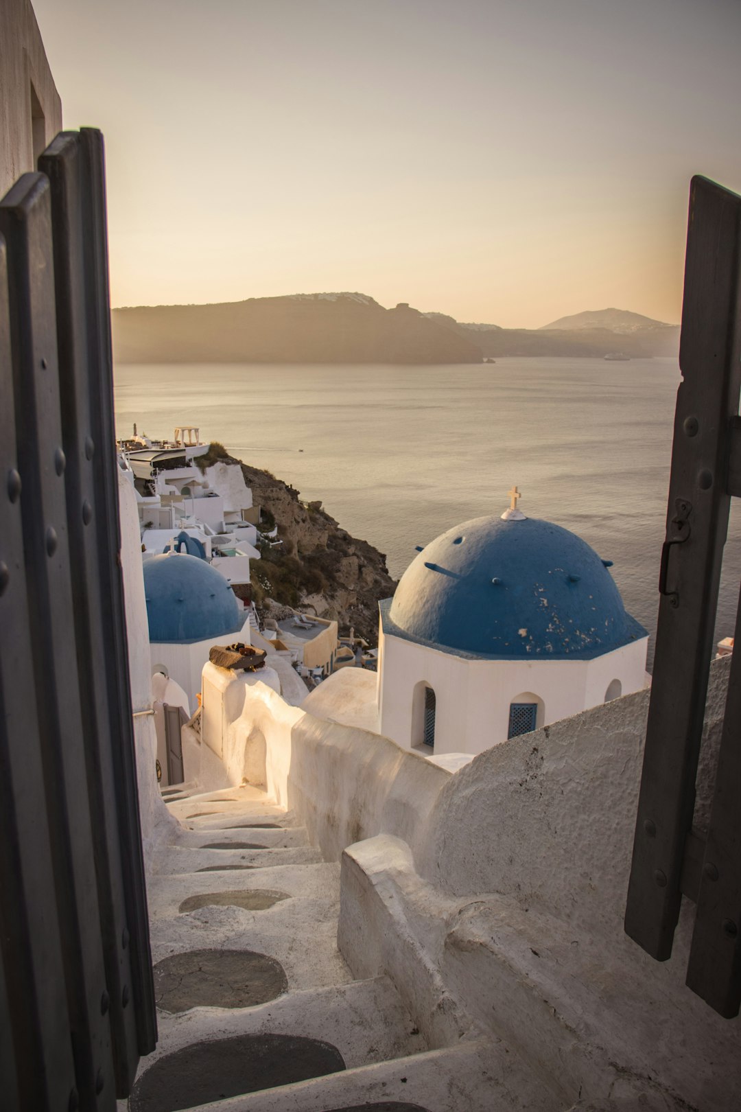 blue and white dome building near body of water during daytime