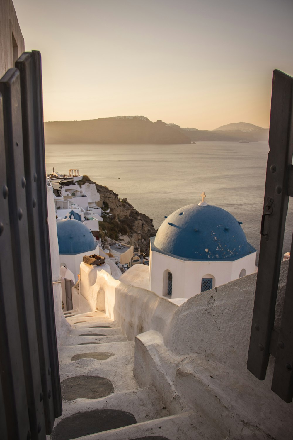 blue and white dome building near body of water during daytime