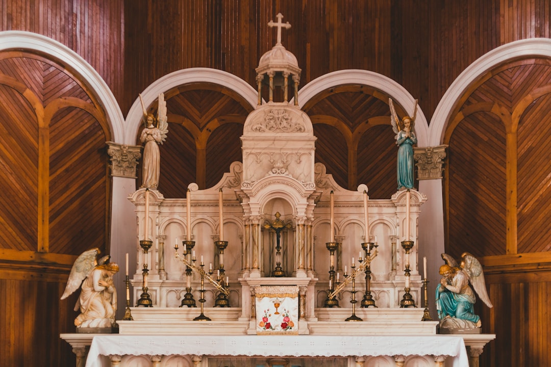 white and brown concrete church