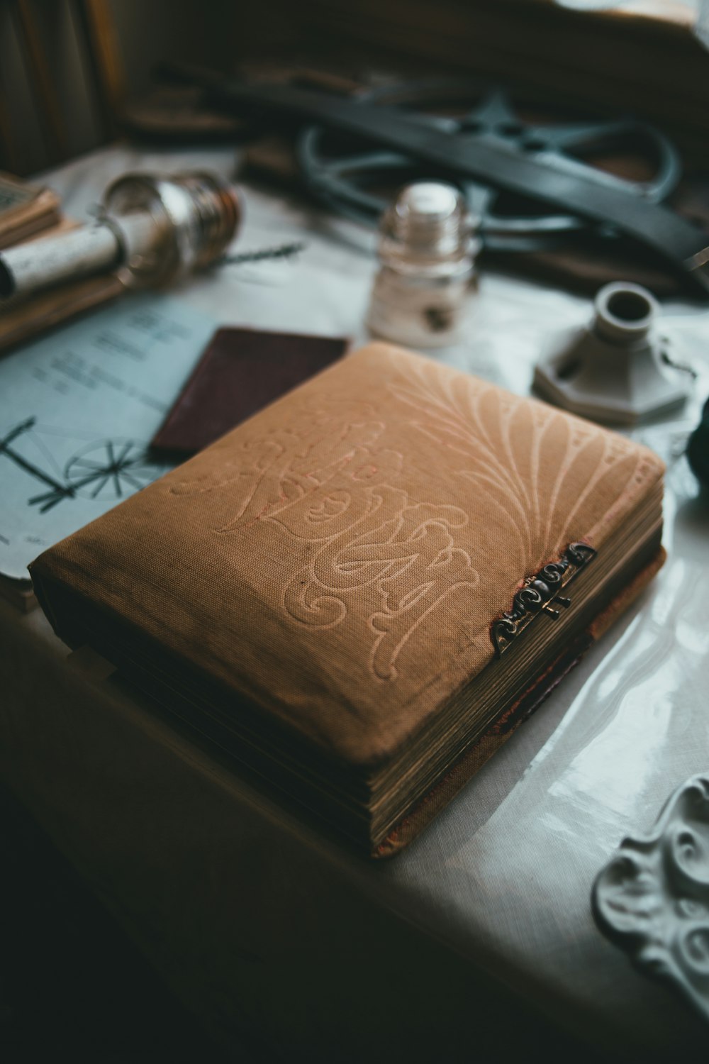 brown book on white table