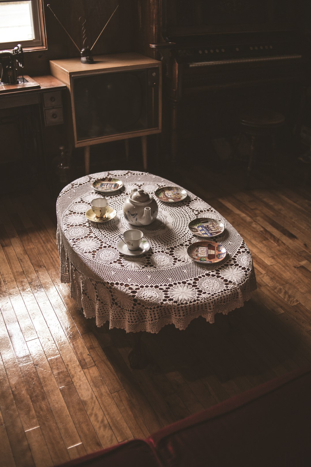 white and brown round table with white table cloth