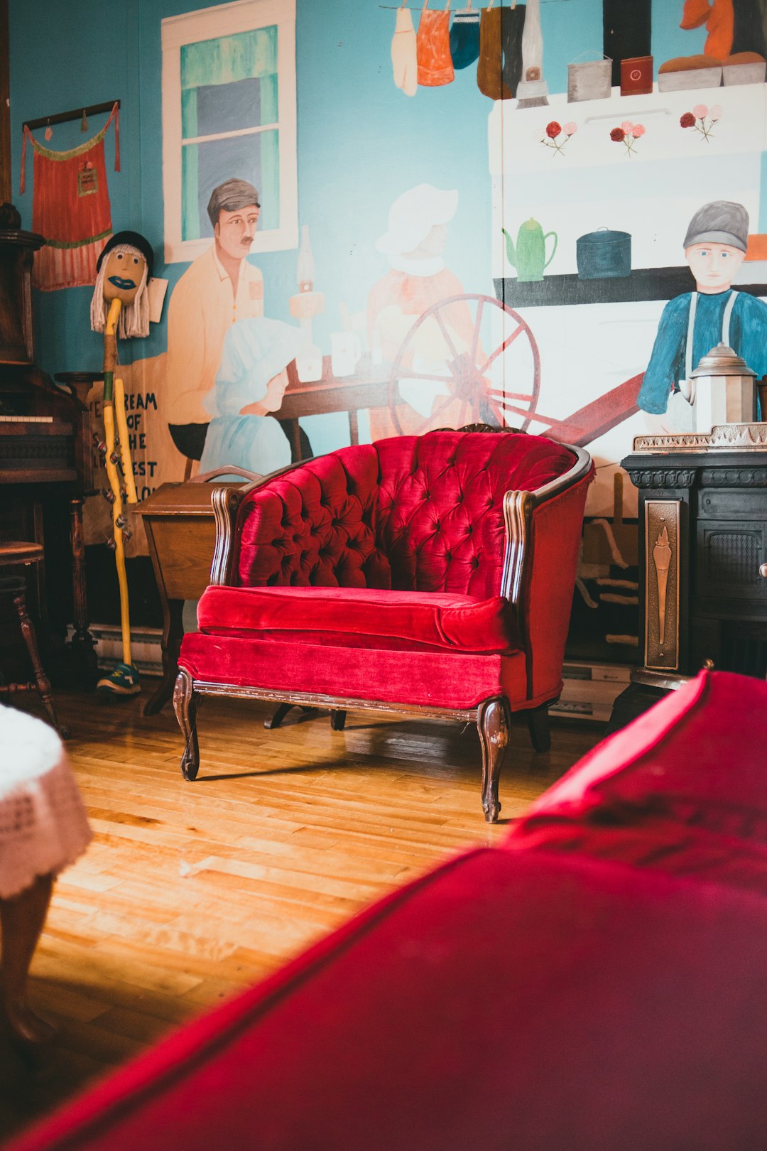 red and white padded armchair