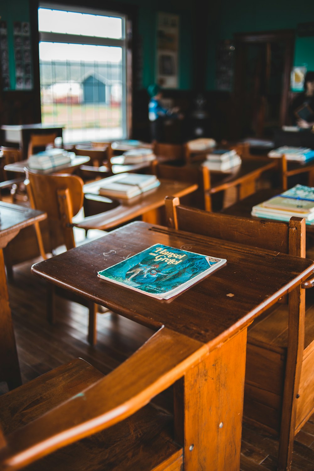 brown wooden table with chairs