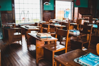 brown wooden table with chairs