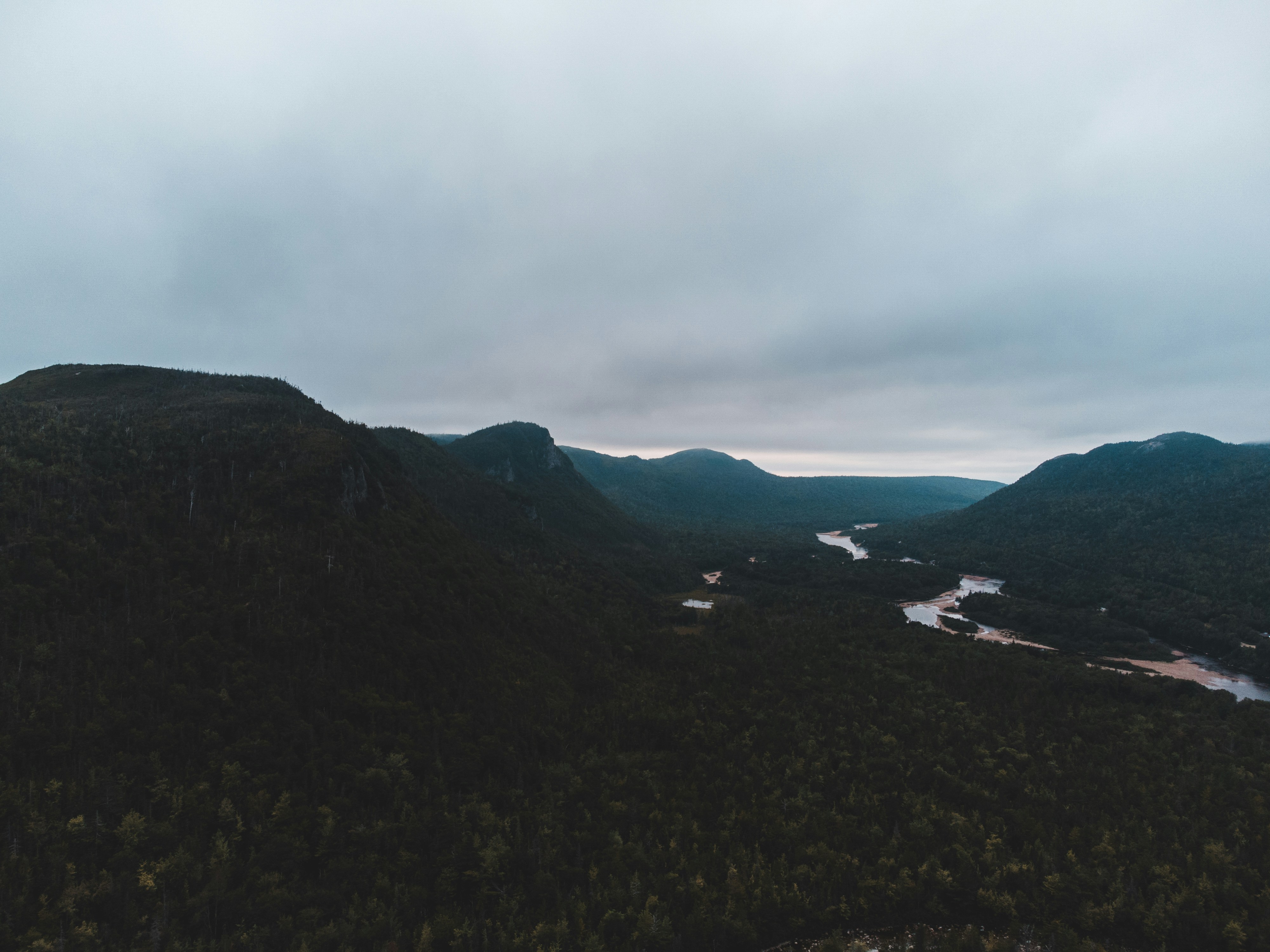 green mountains under white sky during daytime
