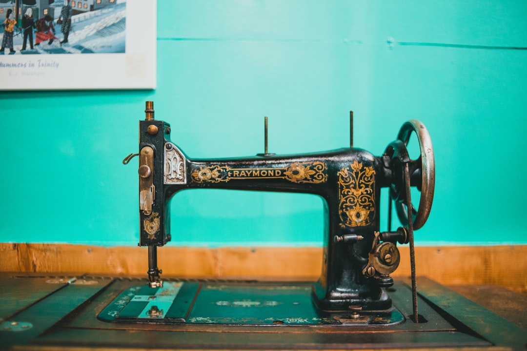 black and green sewing machine