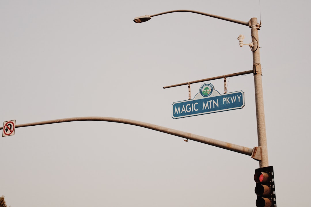 white and green street sign