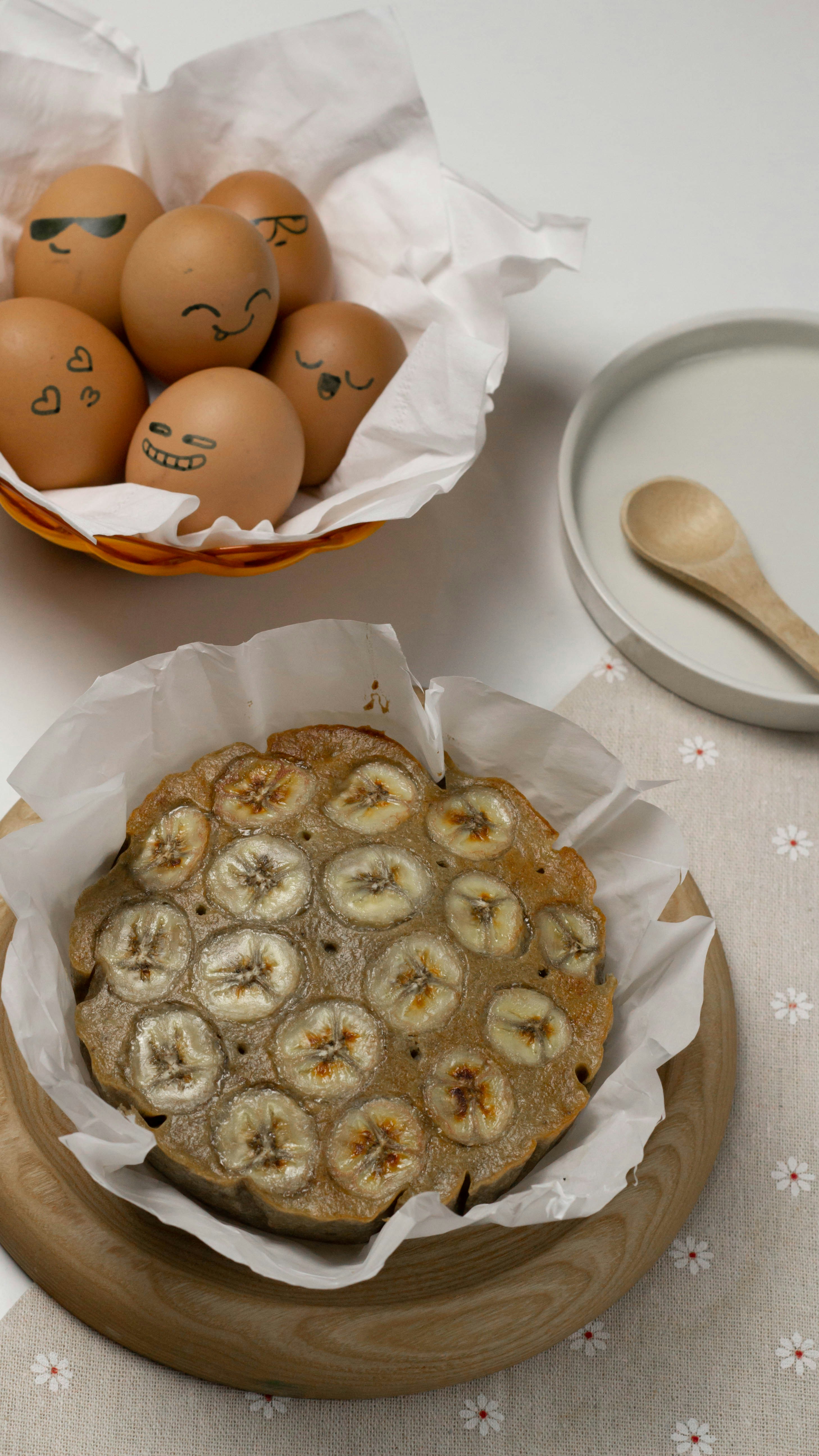 brown round pastry on white paper