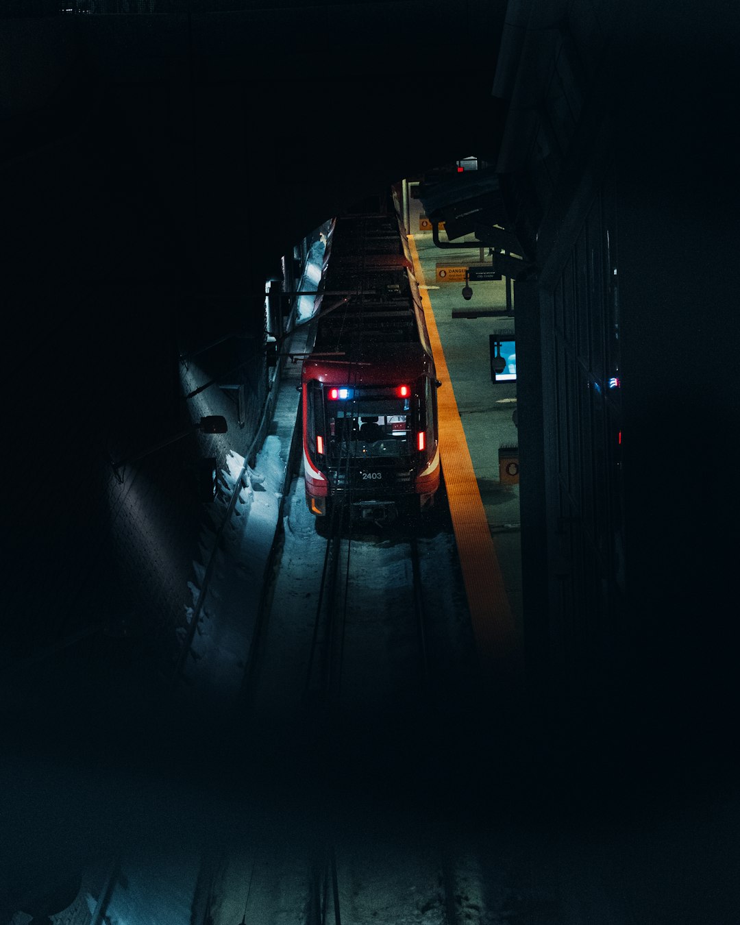 black car on road during night time