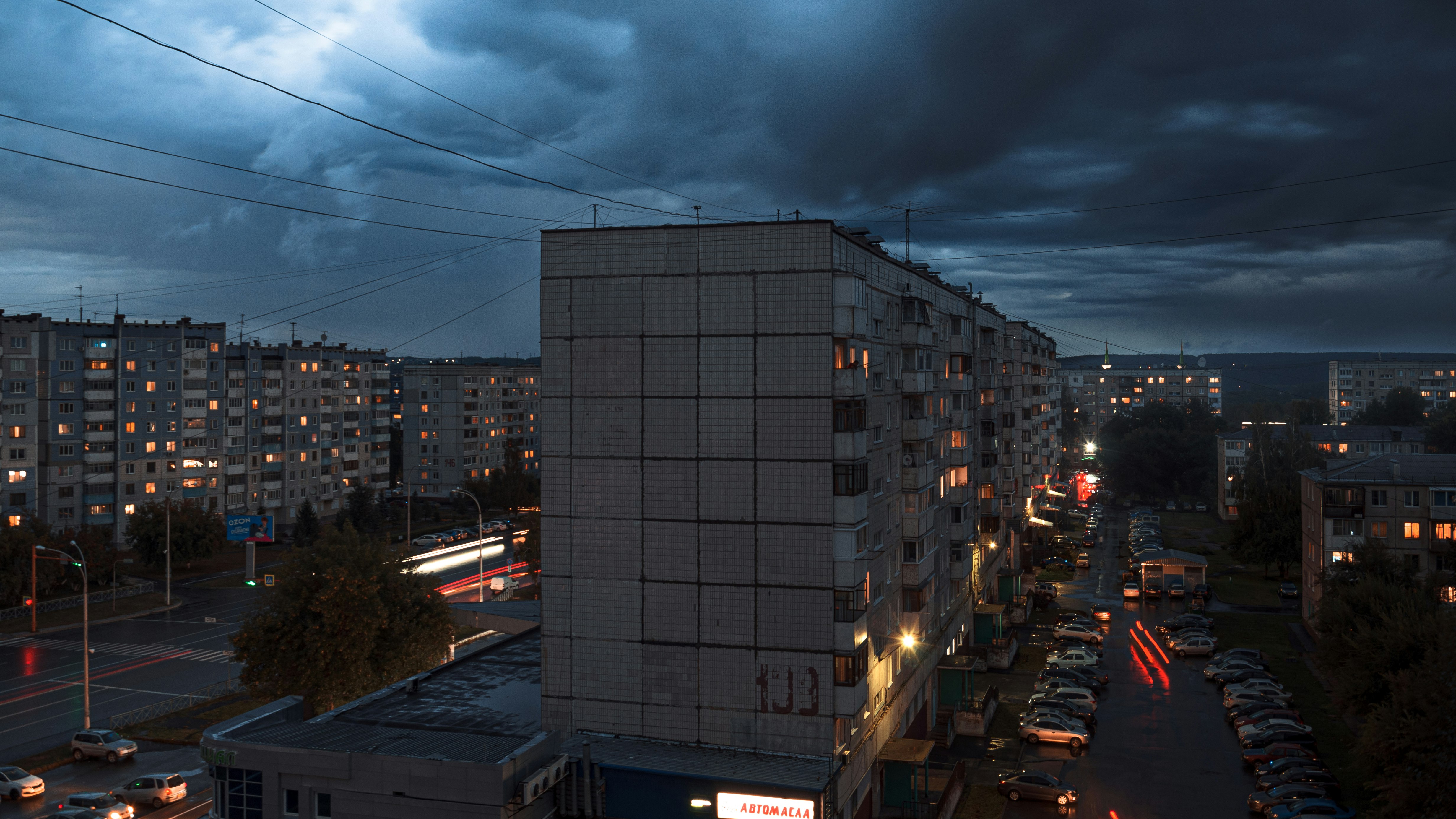 black and white concrete building during night time