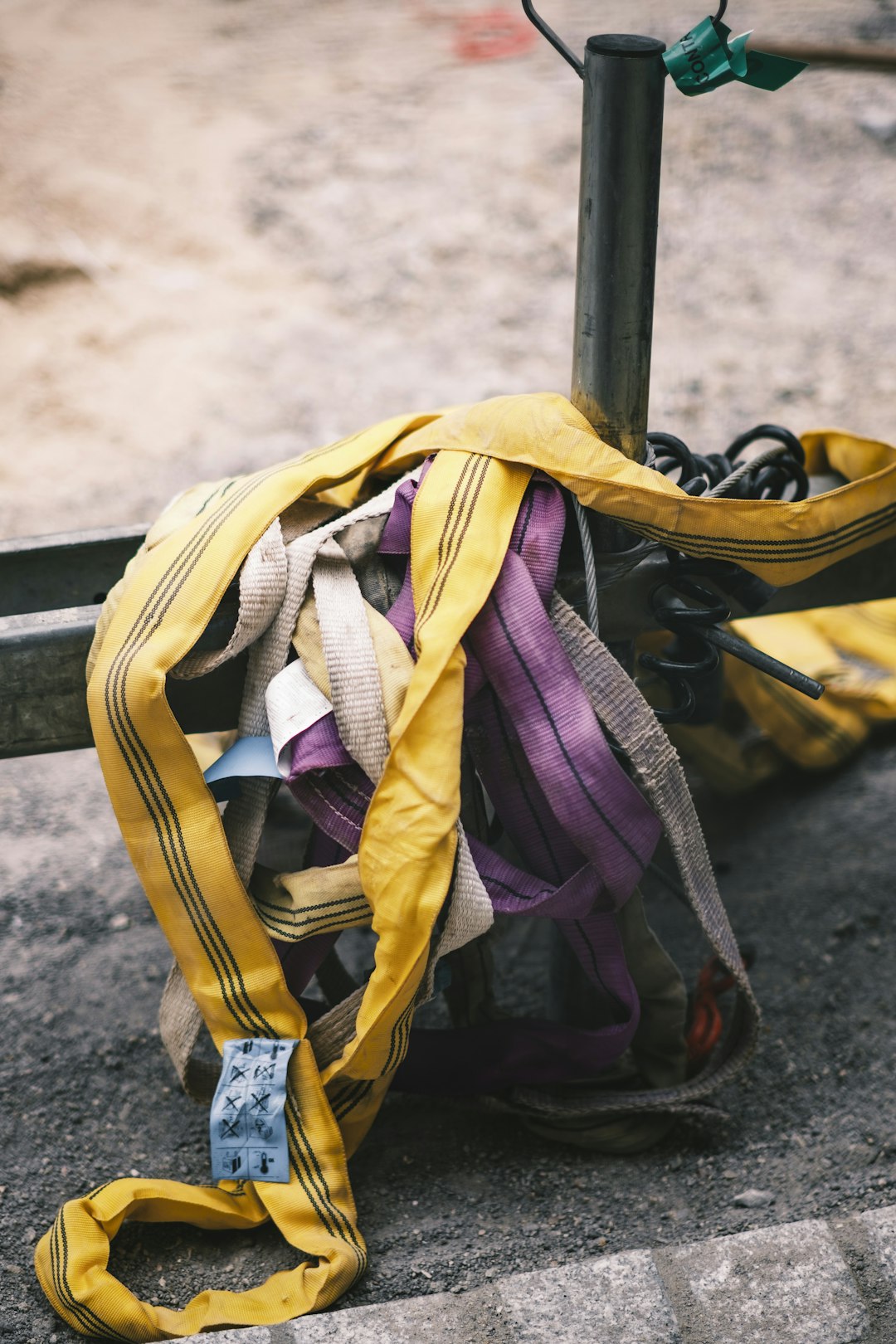 yellow and black backpack on gray concrete floor