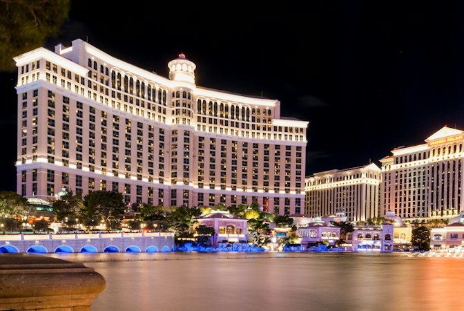 The Bellagio fountains lit up at night on the Las Vegas Strip, a symbol of the tourism economy that drives Southern Nevada jobs