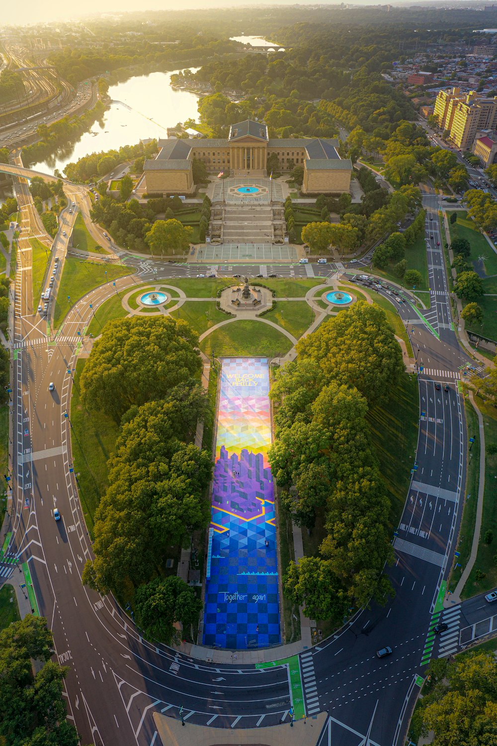 aerial view of green trees and white building