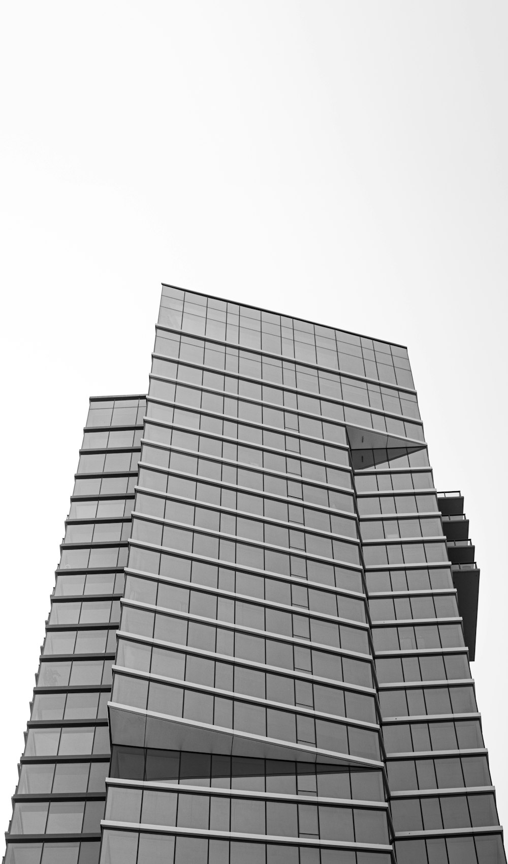 grayscale photo of high rise building