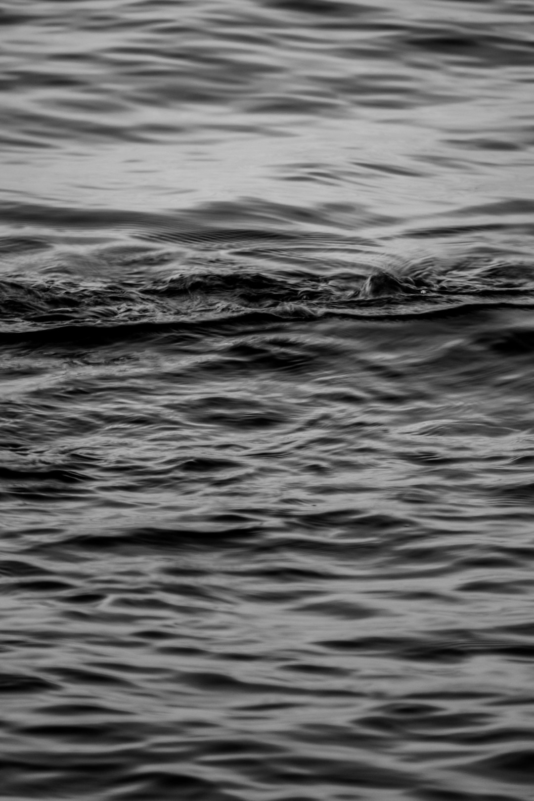 water wave in grayscale photography