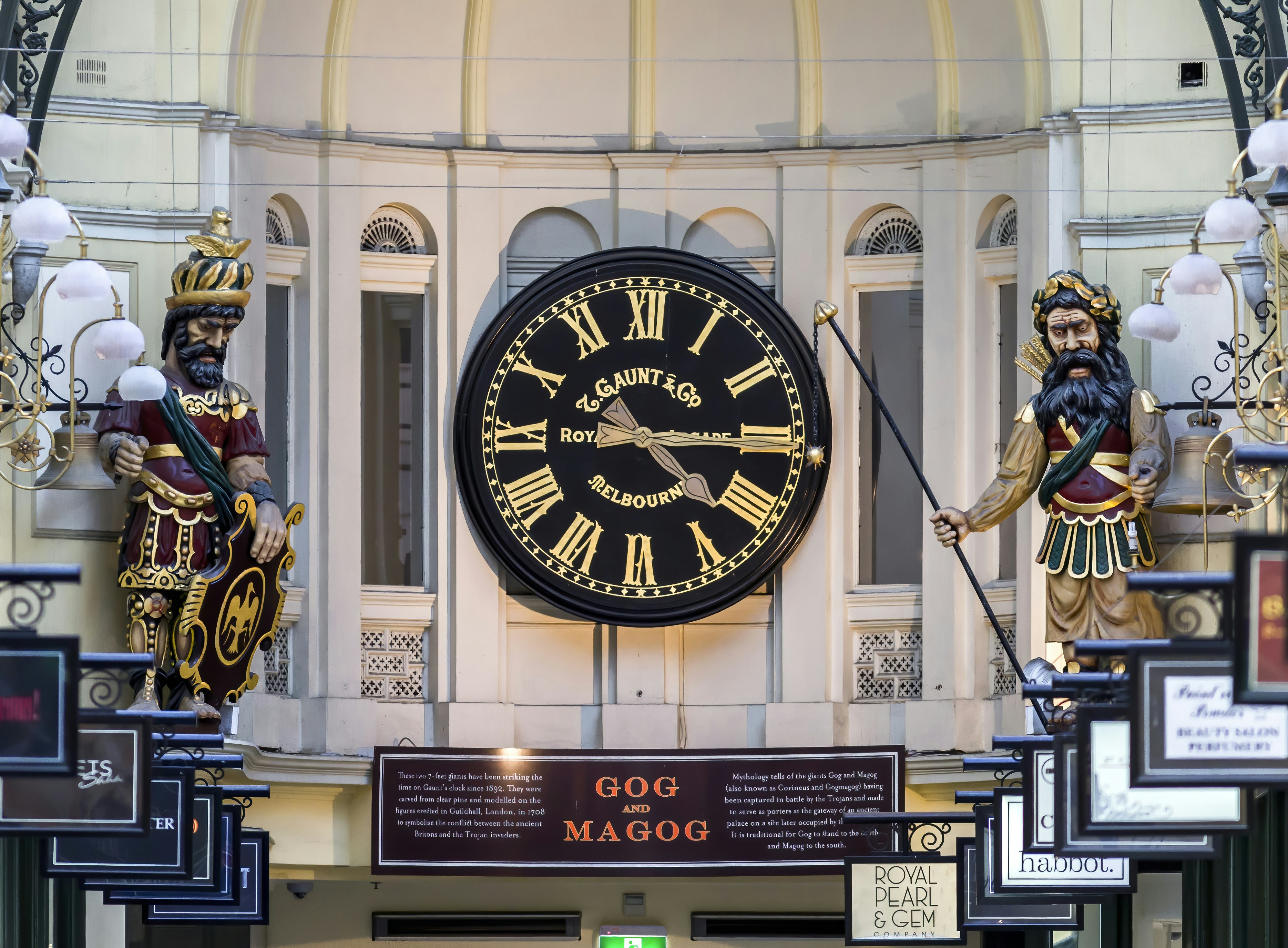 black and white analog clock at 10 00