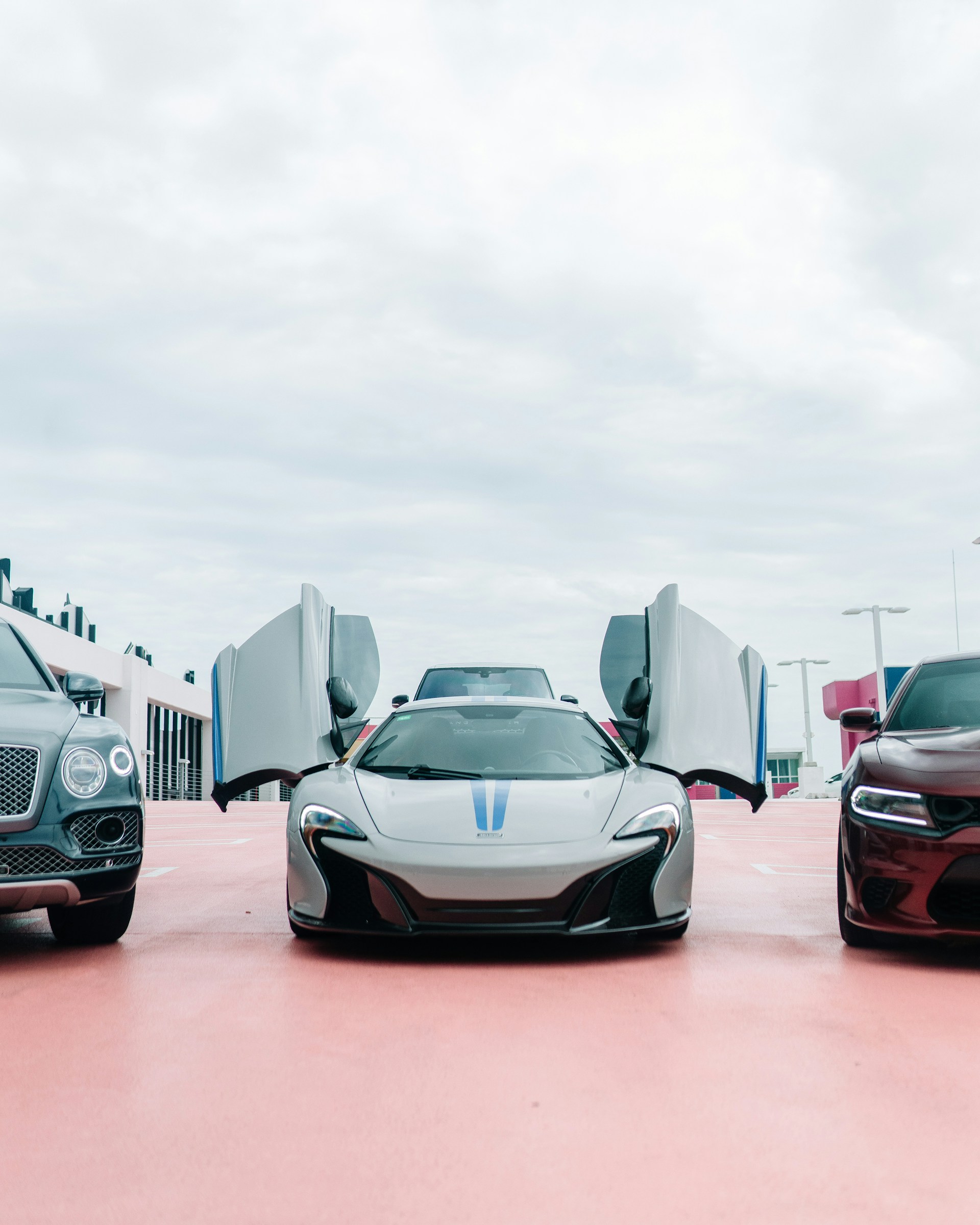 woman wearing yellow long-sleeved dress under white clouds and blue sky during daytime