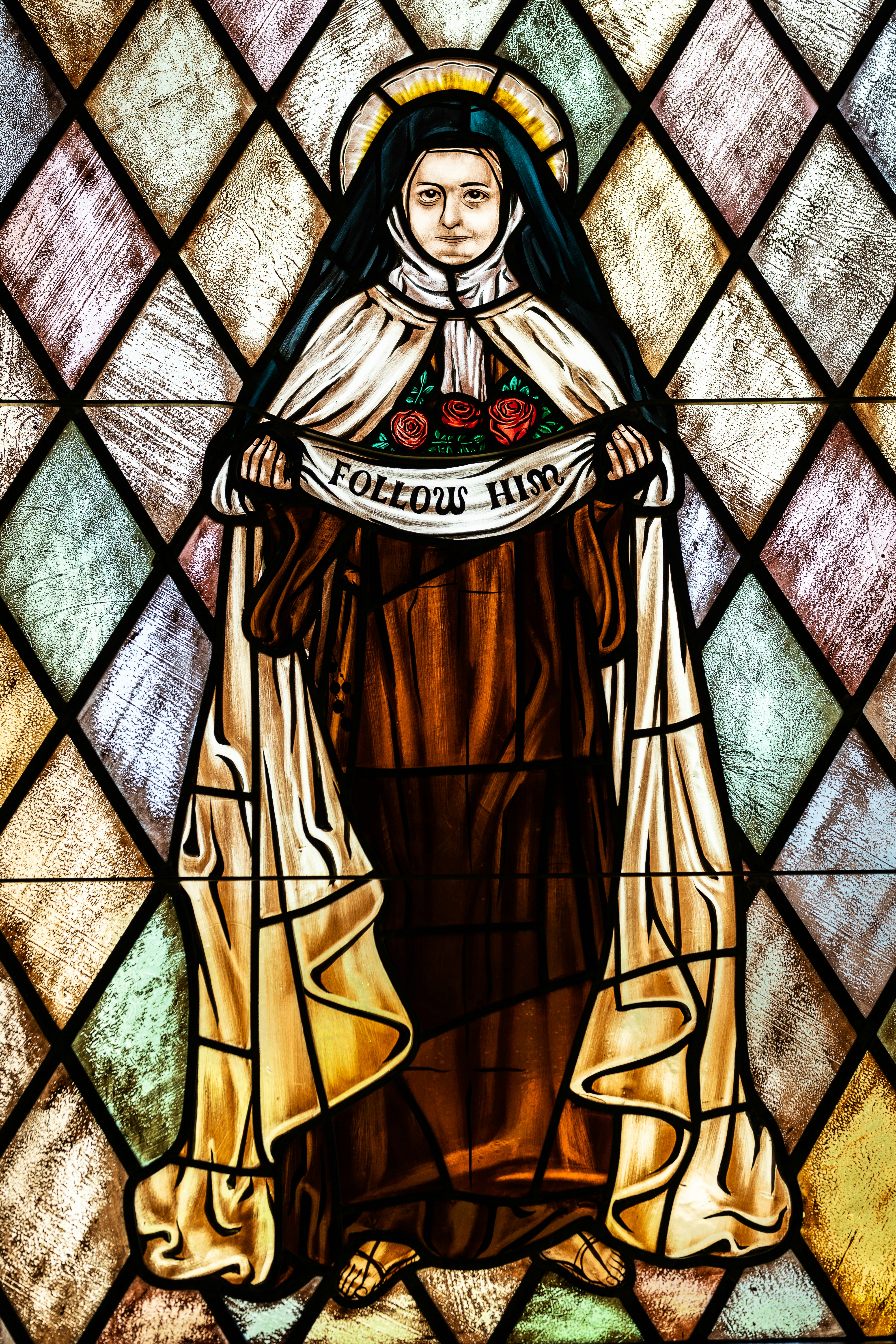 A stained glass window of St. Therese of Lisieux at St. Therese of Lisieux R.C. Church in Montauk, NY 