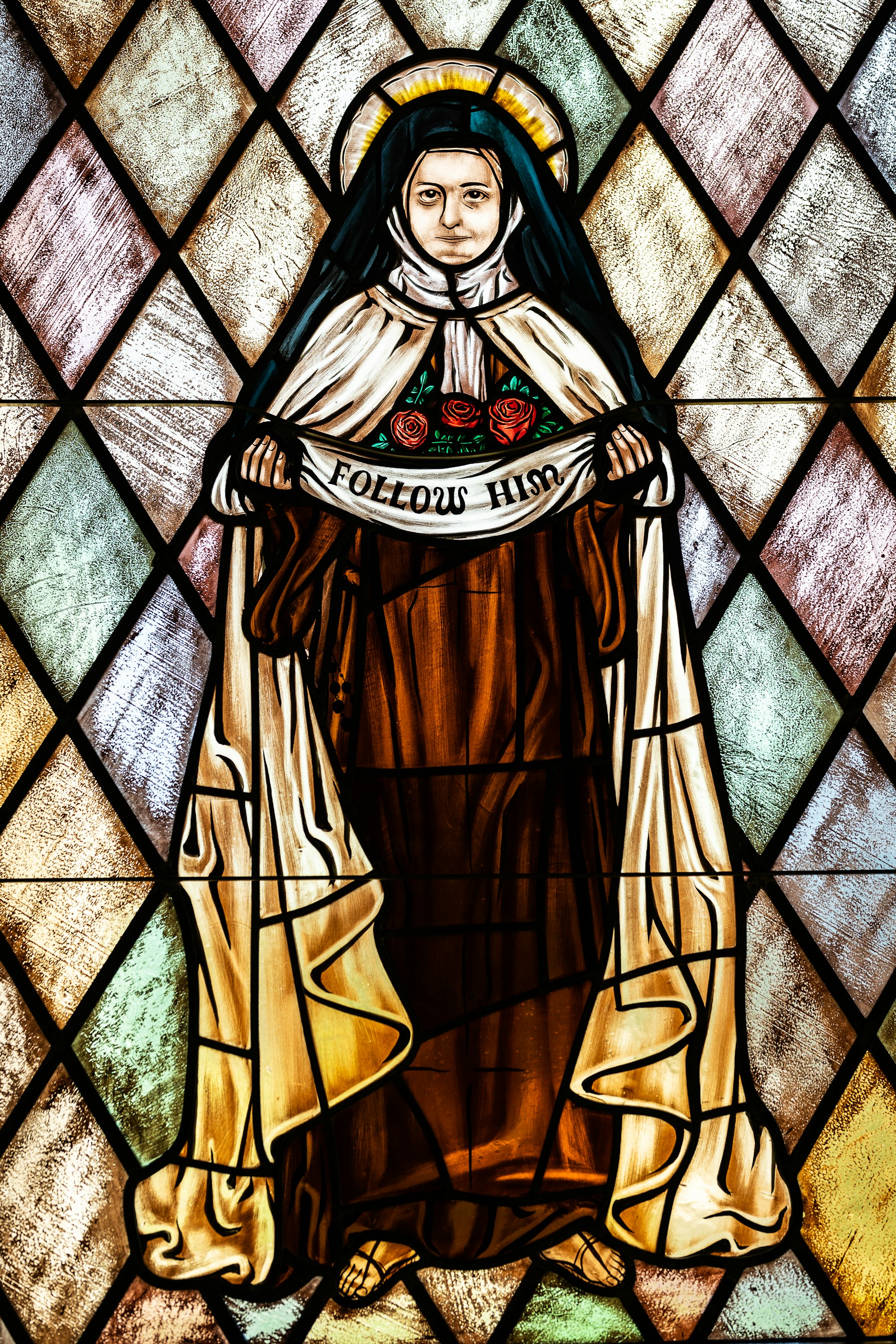 A stained glass window of St. Therese of Lisieux at St. Therese of Lisieux R.C. Church in Montauk, NY 