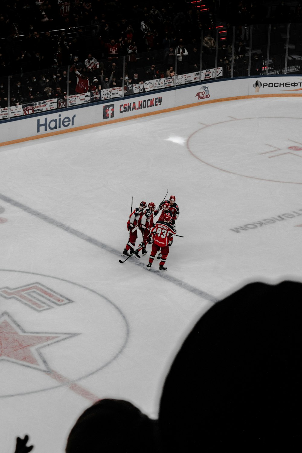 ice hockey players on ice hockey field