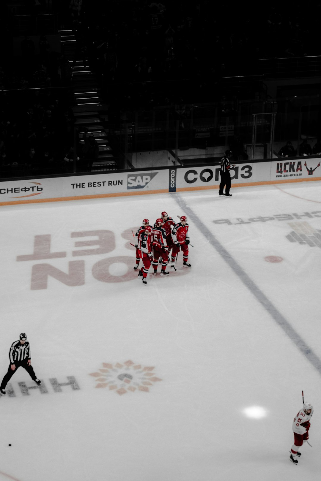 red and white ice hockey game