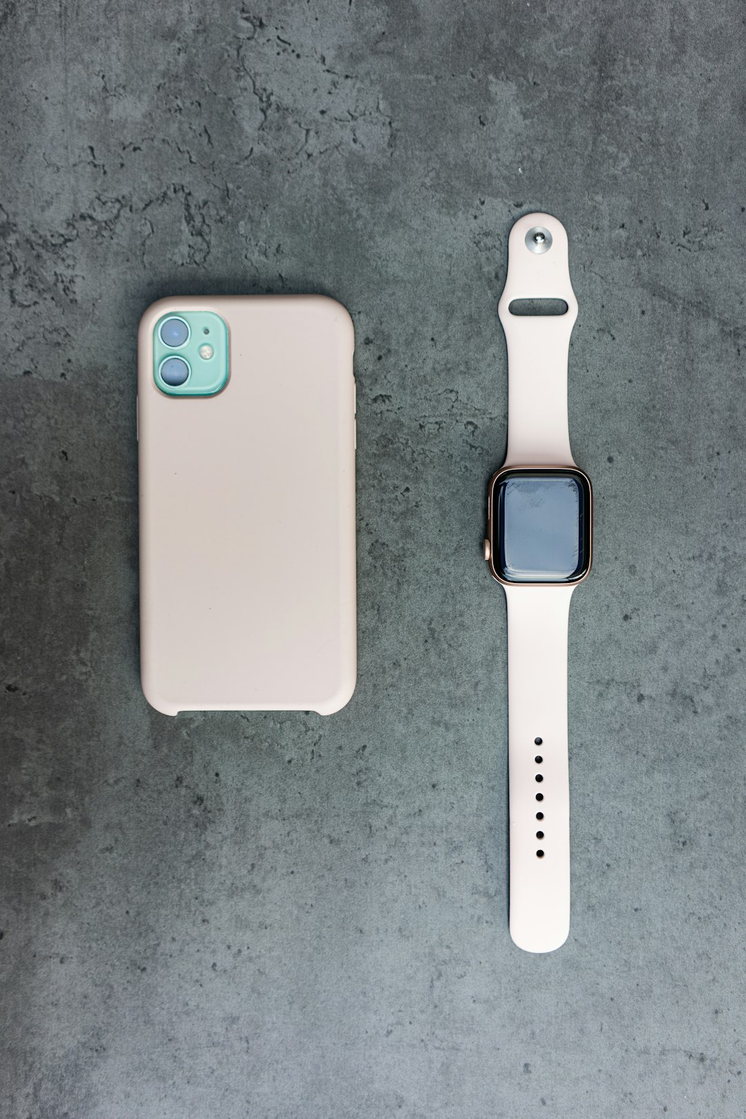 silver aluminum case apple watch with white sport band