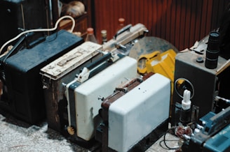 a group of old suitcases sitting next to each other