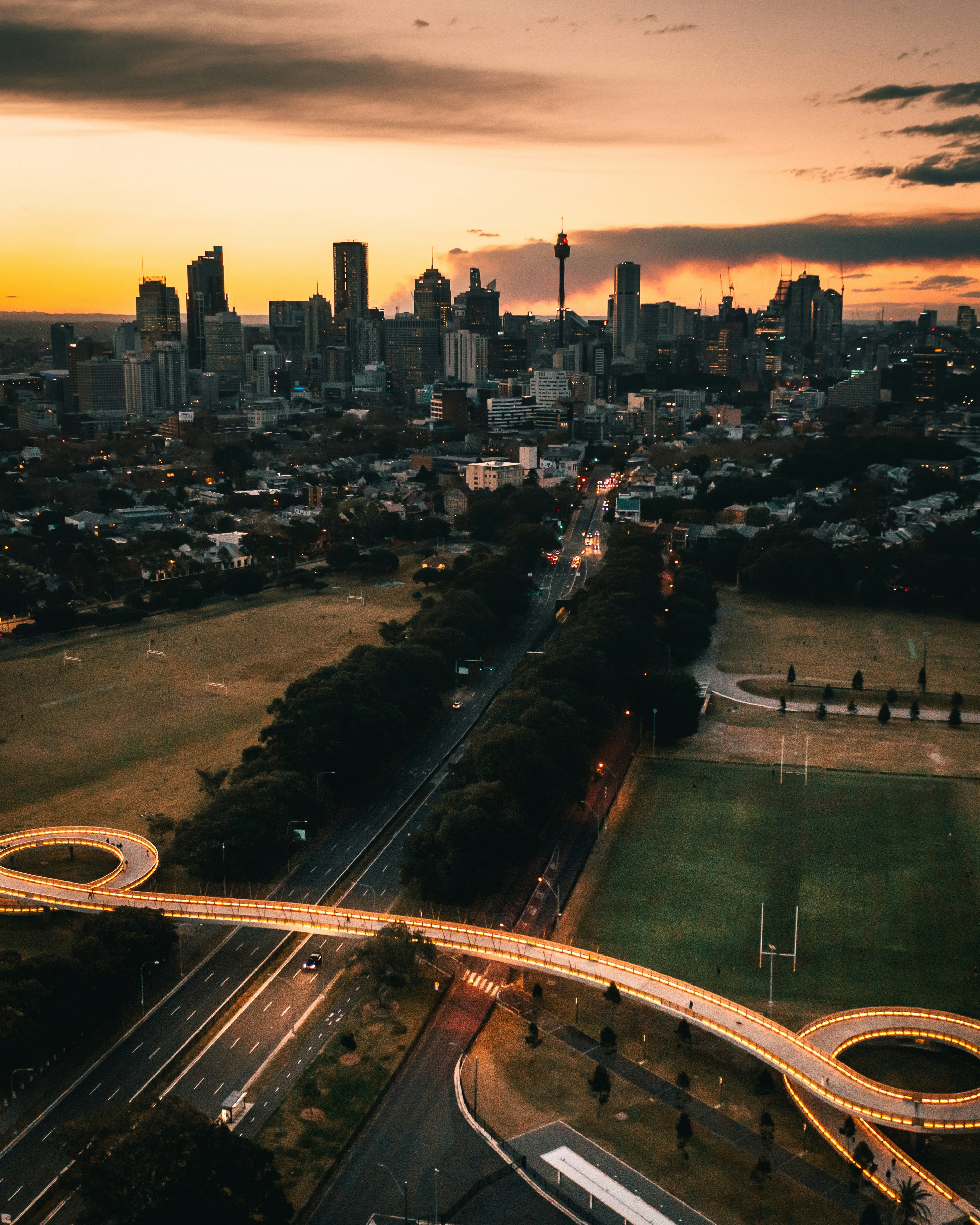 aerial view of city buildings during sunset