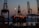 Oil extraction platform at sea during sunset