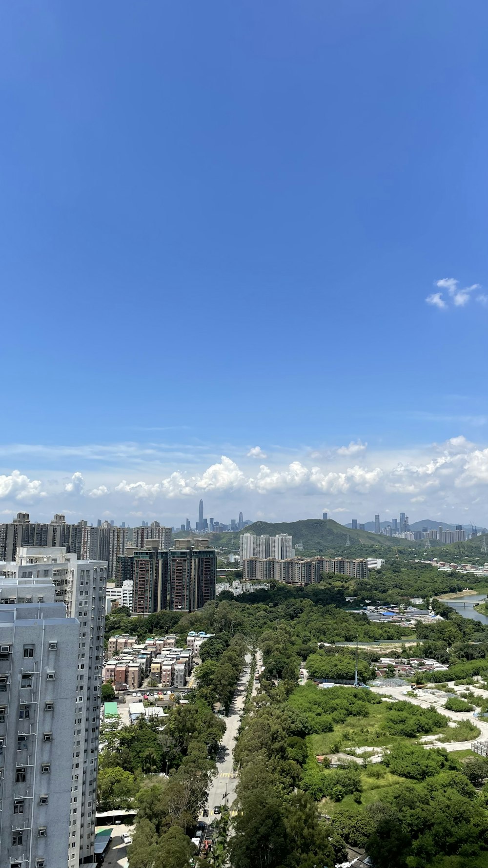 city buildings under blue sky during daytime