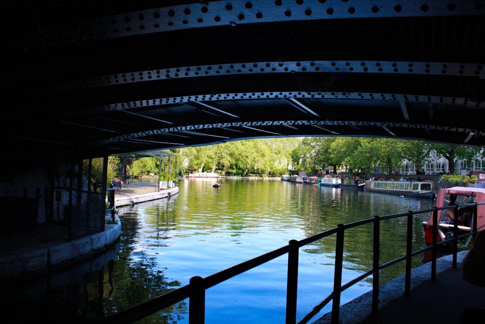 black metal bridge over river