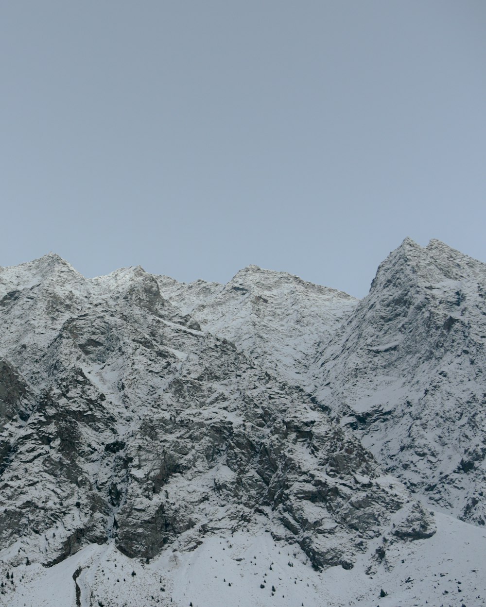 snow covered mountain during daytime