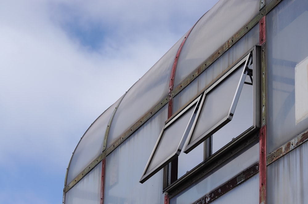 white and red building under white sky during daytime