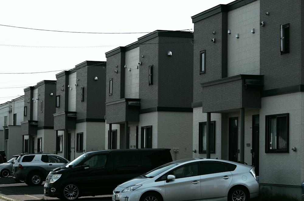 cars parked in front of building