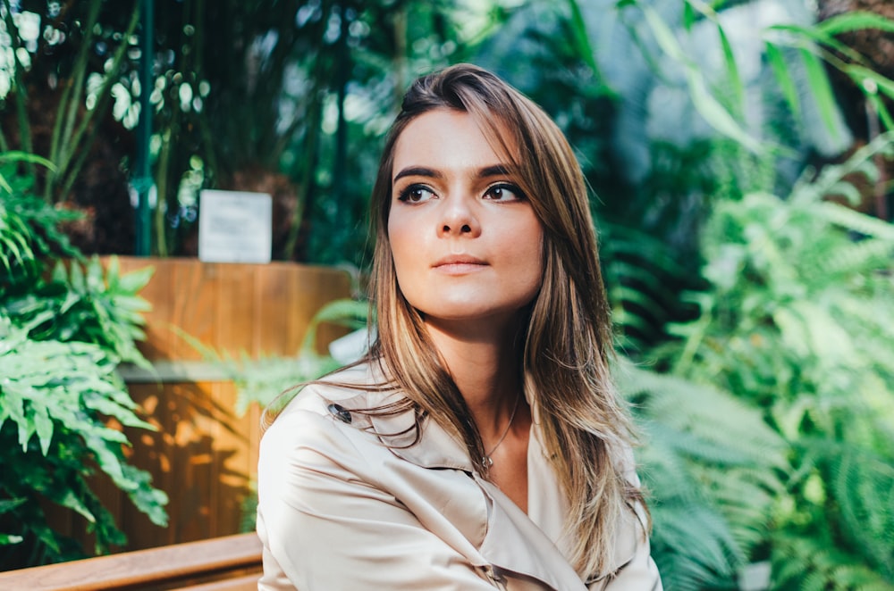 woman in beige button up shirt