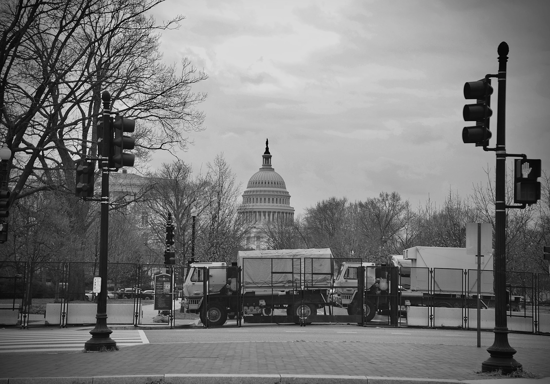 grayscale photo of cars on road