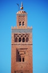brown concrete building under blue sky during daytime