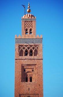 brown concrete building under blue sky during daytime