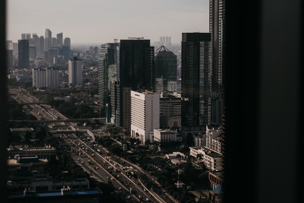 city buildings under gray sky during daytime