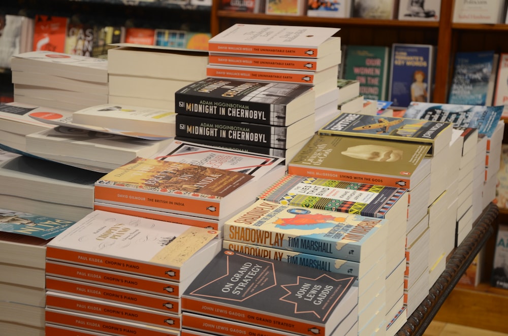 stack of books on white table