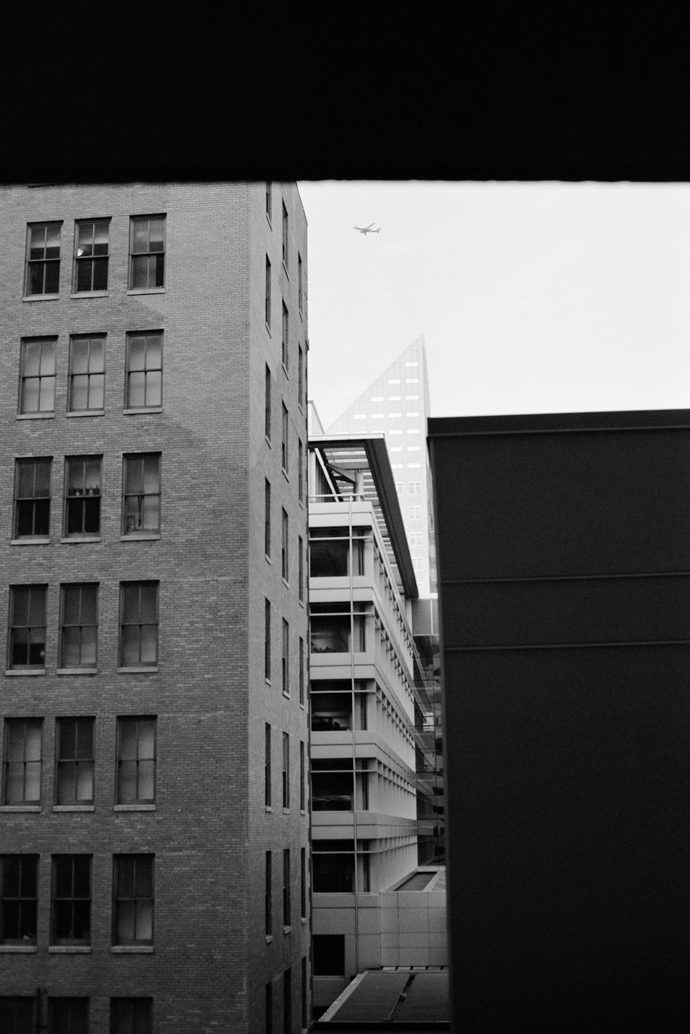 grayscale photo of concrete building