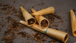 brown wooden stick on brown soil