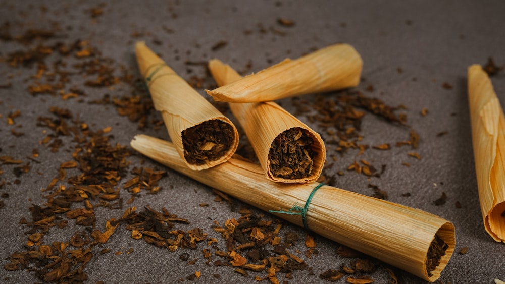 brown wooden stick on brown soil