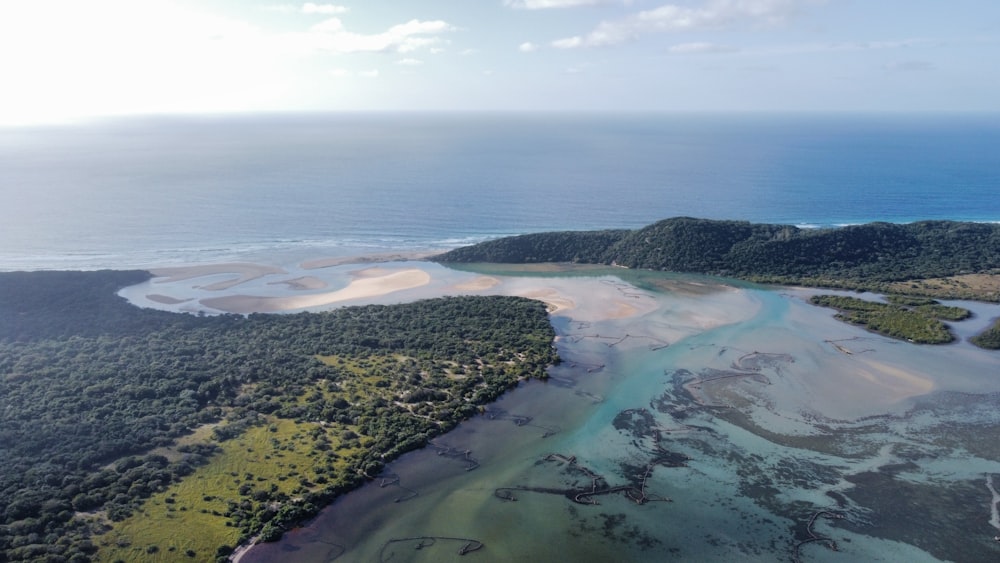 an aerial view of an island and a body of water