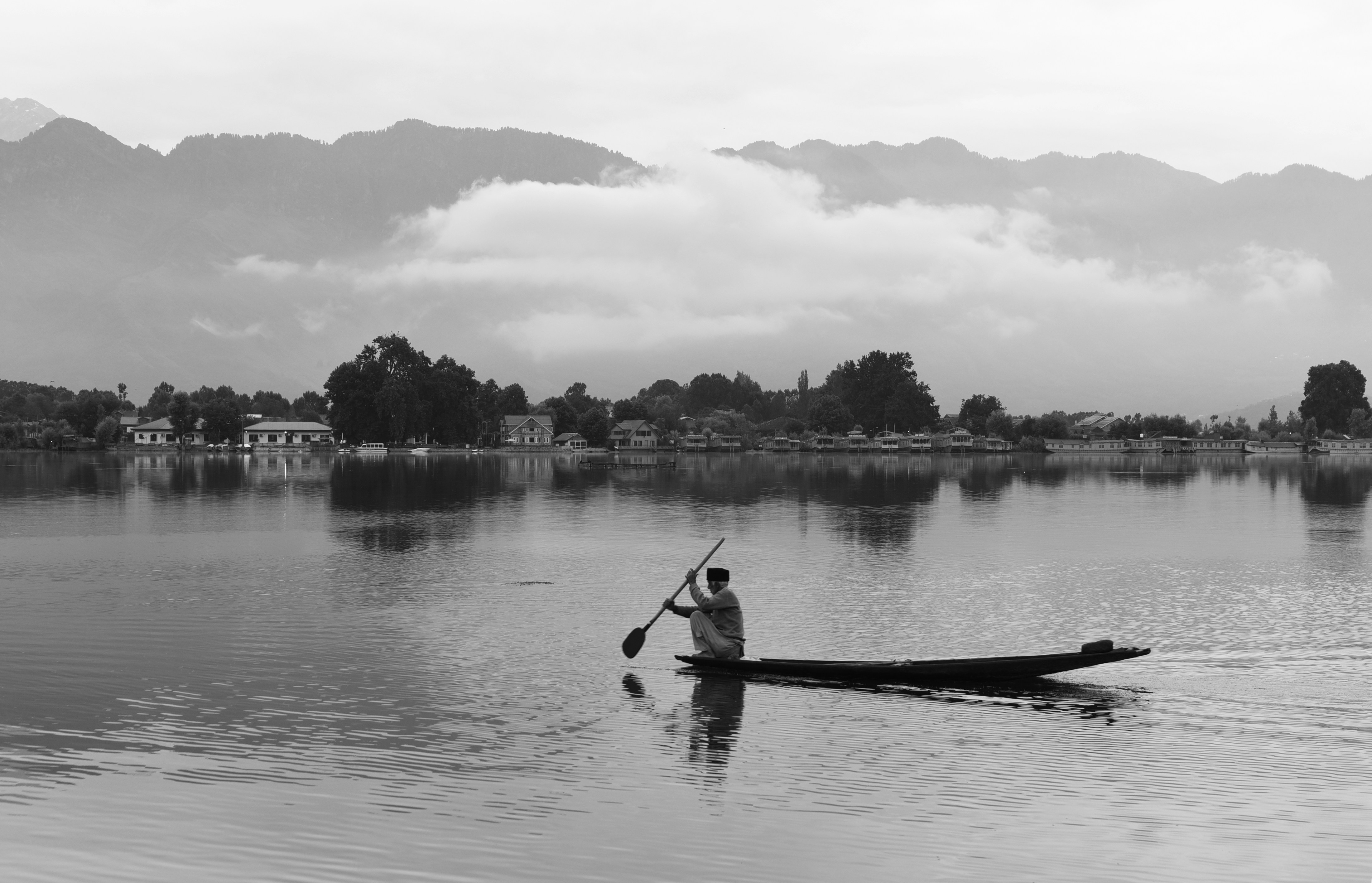 A boatman in a lake in Kashmir