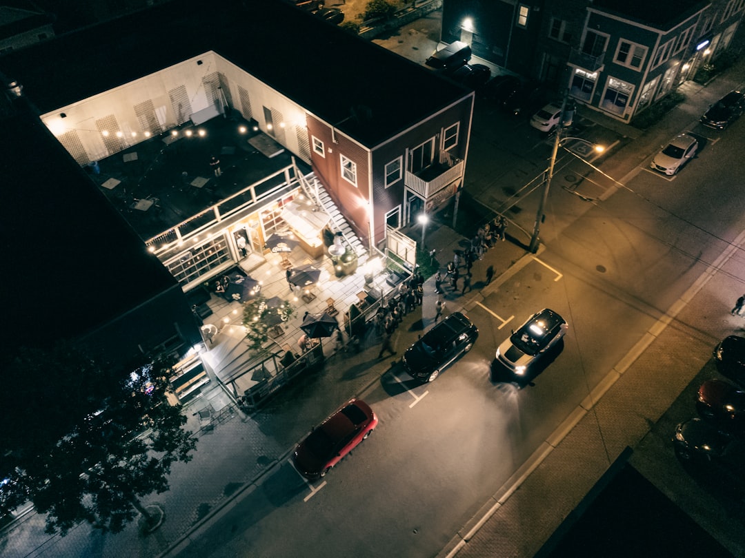 cars parked on parking lot during night time